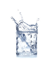 Glass of water with splash on white background