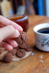 A photo of a pastry and two glasses of a drink on a wooden table