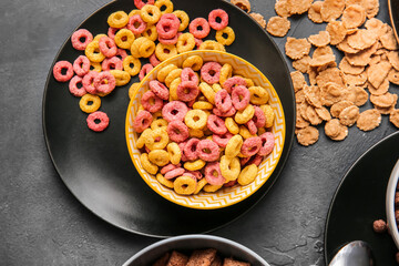 Different cereals on dark background