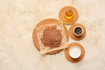 Composition with flax seeds, oil and spices on grunge background