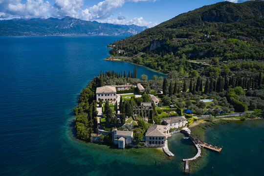 Top view of baia delle sirene on the coastline of Lake Garda. Baia delle Sirene on the coastline. Aerial view of Parco Baia delle Sirene, Lake Garda, Italy. Panorama of punta san vigilio.