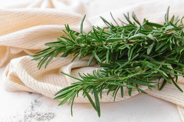 Fresh rosemary on light background, closeup