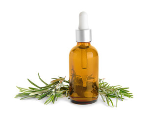 Bottle of essential oil and fresh rosemary on white background