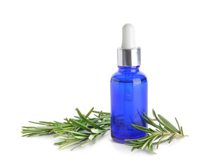 Bottle of essential oil and fresh rosemary on white background