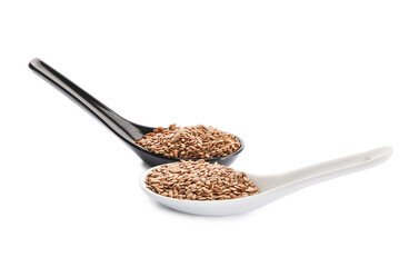 Spoons with flax seeds on white background