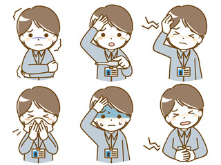 体調の悪いオフィスカジュアルな男性