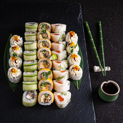 sushi on the black background