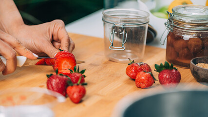 Woman Preparing Fruits for Canning Preservation.