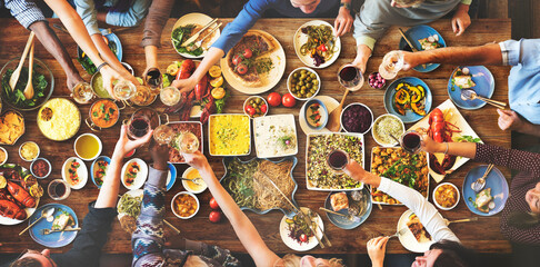 Group of diverse people are having lunch together