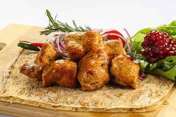 Chicken breast kebab shashlik served salad