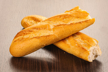Crust tasty baguette over board