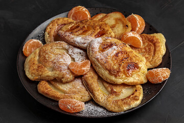 Pancake breakfast. Sweet homemade dessert plate. Delicious morning cuisine with tasty fresh tangerine. Gourmet bakery recipe. Yellow hotcake pile, healthy cuisine
