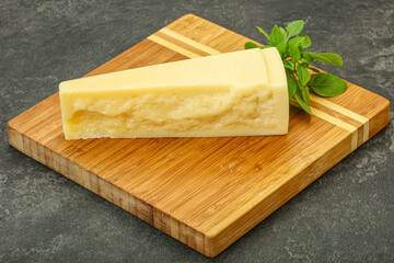 Hard parmesan cheese served basil