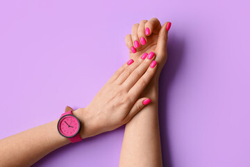Woman with beautiful manicure and wristwatch on color background - obrazy, fototapety, plakaty
