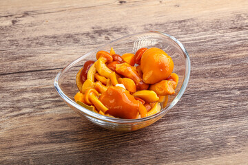 Marinated pickled honey mushrooms in the bowl