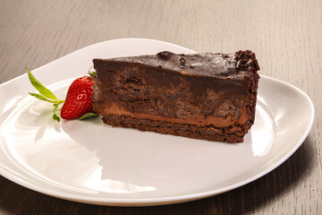 Sweet chocolate cake served strawberry