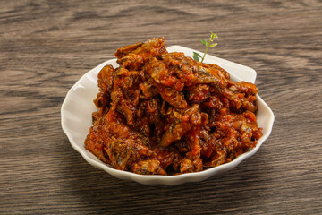 Canned anchovy in tomato sauce