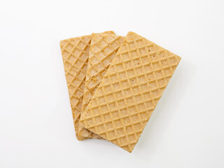 Stack of waffles isolated on white background. Top view.