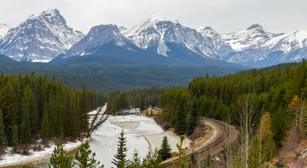 Stunning view of Morant's Curve Railway and Rocky montains in Banff National Park, Alberta, Canada.
