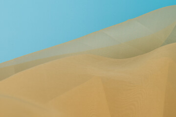 Yellow color tulle fabric texture  with beautiful closeup and elegance detail fabric background