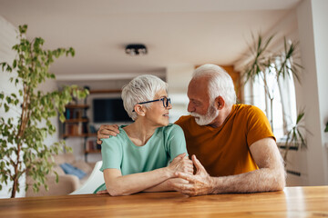 Mature husband, showing affection to his mature wife.