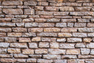 Fototapeta premium Old brick and stone wall as background