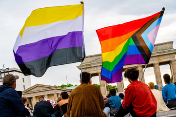 People stand up for the rights of transgender people in front of the brandenburger gate on the...