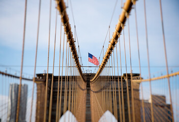 Brooklyn bridge with american flag