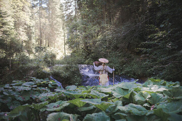 European Shugendo monk in traditional outfit hiking in the Austrian mountains, Austrian, Ötscher