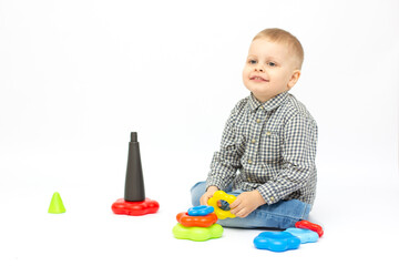 toddler child boy playing toy blocks isolated