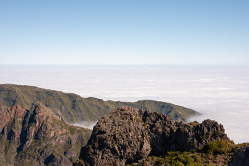 Fototapeta premium View above the clouds from Pico do Arieiro peak, Madeira Island. 