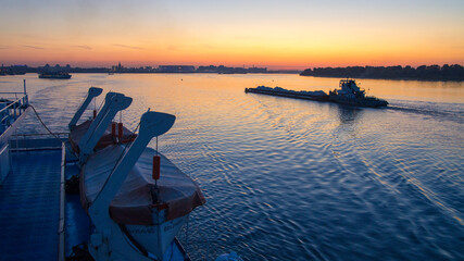 Volga landscape at sunset. Ships.