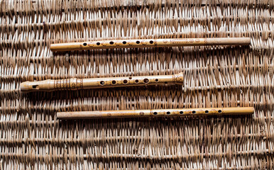 bamboo handmade flute , vintage musical instrument © VetalStock