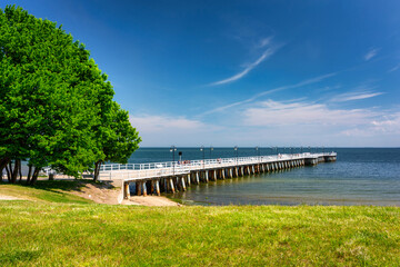 Obraz premium Summer scenery of the Baltic Sea at the pier in Gdynia Orlowo, Poland