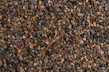 background made of a closeup of a pile of pebbles