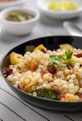 Sabudana khichdi is an Indian dish made from soaked sago or tapioca pearls 