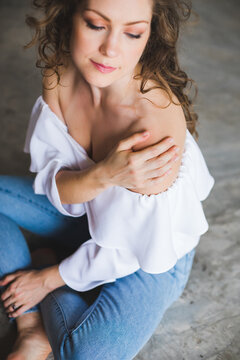 Attractive woman sitting on floor
