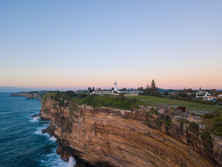 Macquarie Lighthouse by the cliff in the morning.