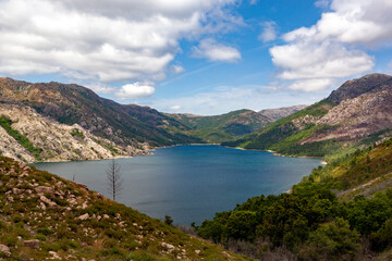 Lake with mountains and clouds 