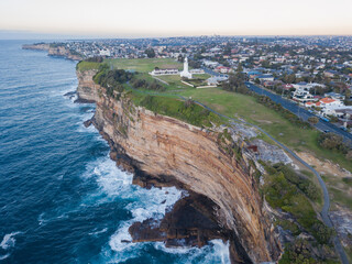 Fototapeta na wymiar Aerial view of Sydney cliff coastline around Macquarie Lighthouse.