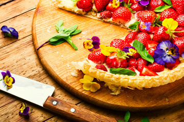Open summer pie with strawberry