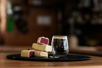 Sweet dessert with coffee at the wooden table