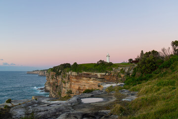 Fototapeta na wymiar Ocean coastline and Macquarie Lighthouse in Sydney, Australia.