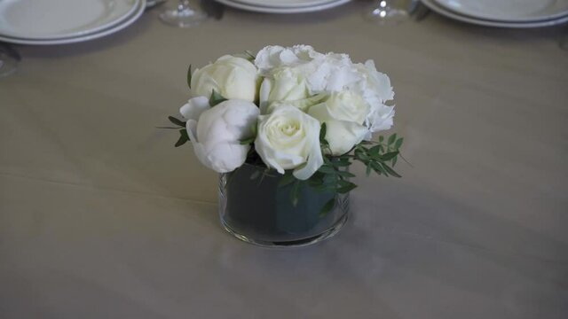 flower arrangement on a table in a restaurant