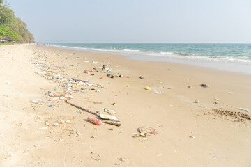 Fototapeta na wymiar Trash on tropical Beach. Plastic pollution environmental problem.