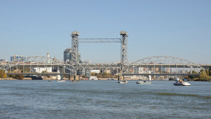 Fototapeta premium Passage of the ship under the drawbridge by fishermen