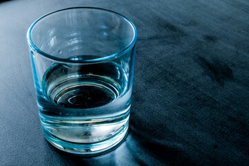 Half-full or half-empty glass of water, demonstrates the saying that opposes positivists and negativists, concept