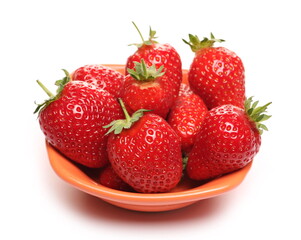 Fresh strawberries in ceramic bowl isolated on white background