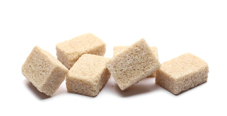 Brown cane sugar cubes isolated on white background