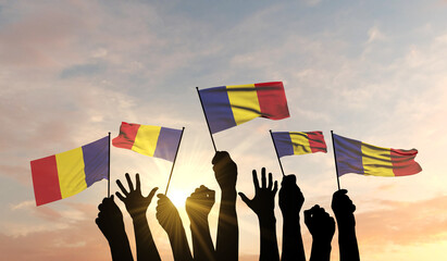 Silhouette of arms raised waving a Romania flag with pride. 3D Rendering - obrazy, fototapety, plakaty